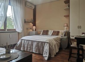 Katil atau katil-katil dalam bilik di Il Nido Segreto b&b-Villa Varinelli