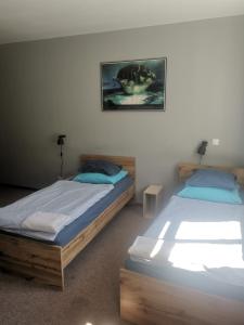 Posteľ alebo postele v izbe v ubytovaní Bemma Apart Hostel