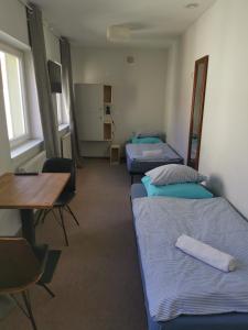 Posteľ alebo postele v izbe v ubytovaní Bemma Apart Hostel