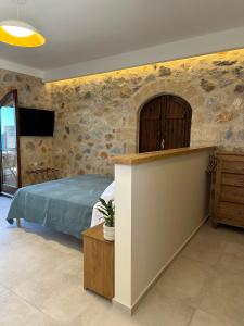 Posteľ alebo postele v izbe v ubytovaní Papanestoras Apartments