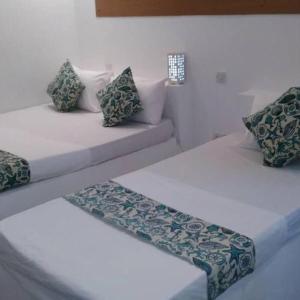 Postel nebo postele na pokoji v ubytování Varadero Zanzibar Hotel