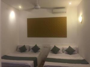 Postel nebo postele na pokoji v ubytování Varadero Zanzibar Hotel