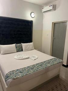 Cama ou camas em um quarto em Varadero Zanzibar Hotel