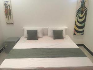 Postel nebo postele na pokoji v ubytování Varadero Zanzibar Hotel