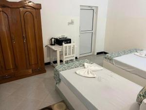 Postel nebo postele na pokoji v ubytování Varadero Zanzibar Hotel