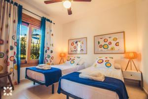 Postel nebo postele na pokoji v ubytování Villa Mykonos by Abahana Villas + 19 fotografií