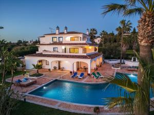 an aerial view of a house with a swimming pool at Quinta Terruta by Ocvillas in Albufeira