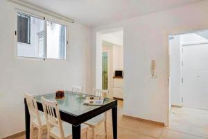 TV a/nebo společenská místnost v ubytování Apartamentos ALAZUL Extramuros