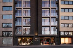 an exterior view of a building with many windows at Lokalist, Istanbul, a Tribute Portfolio Hotel in Istanbul