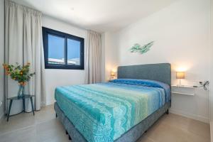 Ένα ή περισσότερα κρεβάτια σε δωμάτιο στο Higueron West Property Collection - La Vida Feliz Andalucia by HWPC +30 φωτογραφίες