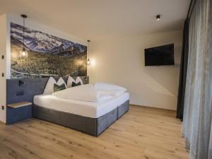 Posteľ alebo postele v izbe v ubytovaní Studio Montanaris Alpine Active Relax-3 by Interhome