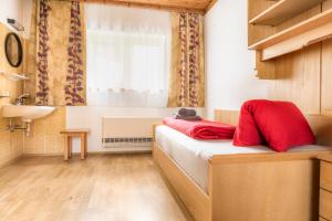 Łóżko lub łóżka w pokoju w obiekcie Chalet Matzhof