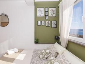 Postel nebo postele na pokoji v ubytování Holiday Home Maro by Interhome