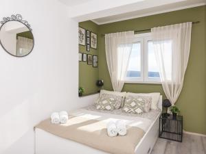 Postel nebo postele na pokoji v ubytování Holiday Home Maro by Interhome