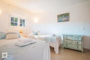 Postel nebo postele na pokoji v ubytování Villa Talaris by Abahana Villas + 16 fotografií