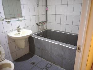 Koupelna v ubytování JS Hotspring + 31 fotografií