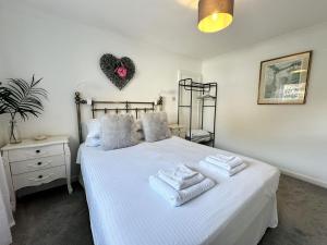 Voodi või voodid majutusasutuse The Cottage Annex toas