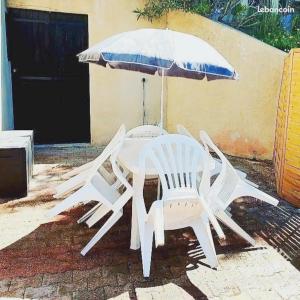 Patio nebo venkovní prostory v ubytování Gite au Rocher
