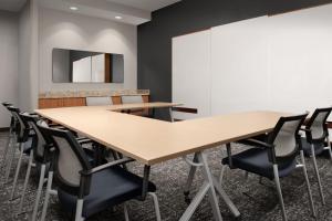 a conference room with tables and chairs at TownePlace Suites by Marriott Cheyenne Southwest/Downtown Area in Cheyenne +58 photos