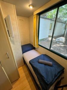 Postel nebo postele na pokoji v ubytování Sona Mobilhome