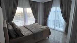 Postel nebo postele na pokoji v ubytování White Bay Resort