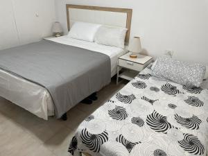 Krevet ili kreveti u jedinici u okviru objekta Apartamento playa La Mata y Guardamar