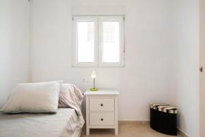 Postel nebo postele na pokoji v ubytování Apartamentos ALAZUL Extramuros