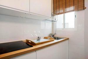 Kuchyň nebo kuchyňský kout v ubytování Apartamentos ALAZUL Extramuros