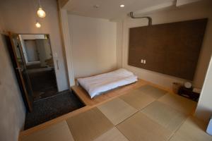 ホステル Cabinにあるベッド