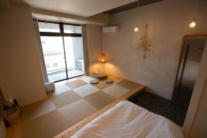 ホステル Cabinにあるベッド