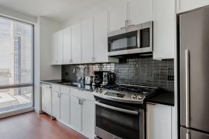 A cozinha ou cozinha compacta de Blueground Hudson Yards sports fitness wd NYC-1484