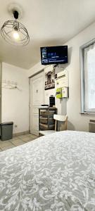 Η κουζίνα ή μικρή κουζίνα στο Studio cosy à Montargis - 13 m² - Parking inclus