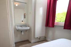 Koupelna v ubytování Nor Saga - Hennequinlaan 10 + 36 fotografií