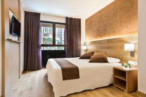 Posteľ alebo postele v izbe v ubytovaní Hotel Acta Azul Barcelona