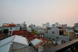 a view of a city with buildings at Nineties homestay in Hue
