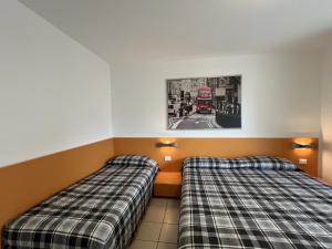 Ένα ή περισσότερα κρεβάτια σε δωμάτιο στο Appartamenti Mare