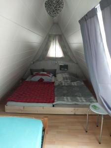 Tempat tidur dalam kamar di Blaue Oase