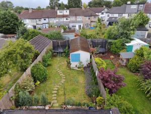 an aerial view of a garden in a residential neighbourhood at Modern large en suite loft room in Bromley, London in Bickley