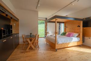Ένα ή περισσότερα κρεβάτια σε δωμάτιο στο Eko Glamping Resort Krištof