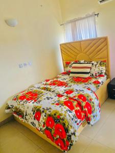 Ένα ή περισσότερα κρεβάτια σε δωμάτιο στο Miraph Apartment
