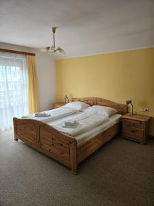Katil atau katil-katil dalam bilik di Ferienhaus Sinning