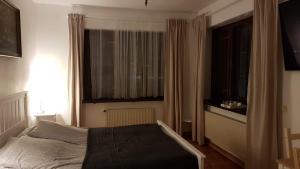 Posteľ alebo postele v izbe v ubytovaní Willa Old House