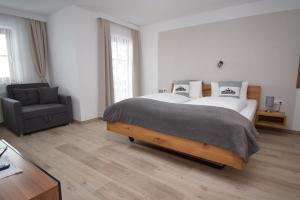 Postel nebo postele na pokoji v ubytování Landhaus Bichlbach