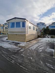a tiny house is parked in a parking lot at Beautiful 3 bedroom holiday home Amazing views in Gisburn