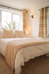 Postel nebo postele na pokoji v ubytování Lemon Tree Rooms - Newly Refurbished Coastal Stay