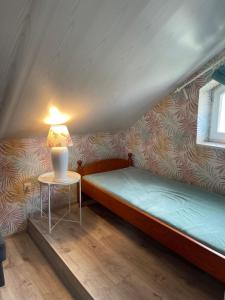 Postel nebo postele na pokoji v ubytování Pokoje Gościnne - Apartamenty MATI