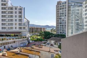 an aerial view of a city with tall buildings at Casa Jois in Empuriabrava