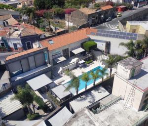 an overhead view of a building with palm trees at Sciara Biscari B&B in Catania