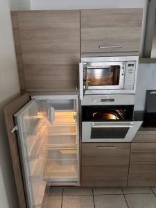 Η κουζίνα ή μικρή κουζίνα στο Maison centre bourg +13 φωτογραφίες