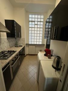 A kitchen or kitchenette at Chiossetto House
